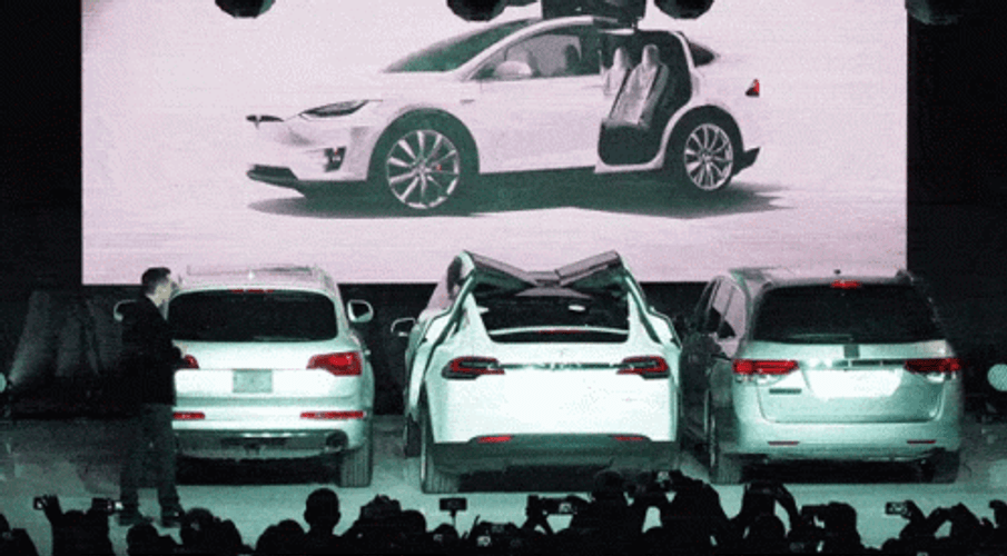 Cool White Tesla Car On Display GIF