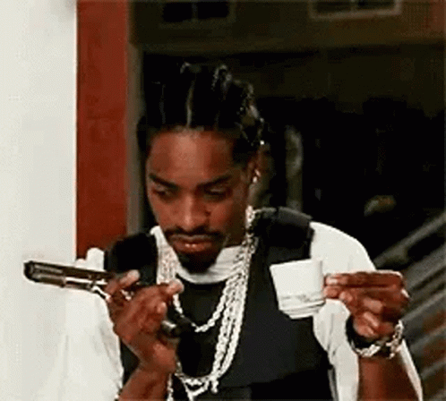 Coolio Drinking Something With A Gun GIF