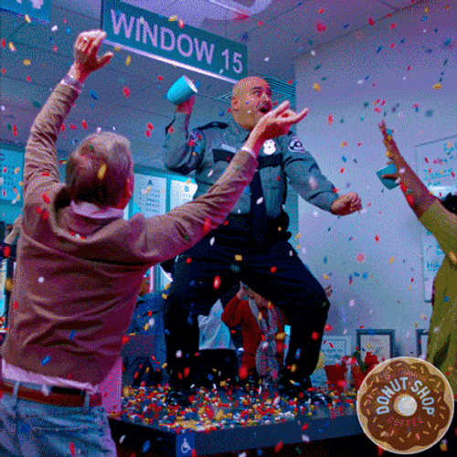 Cop Break Time Dancing Atop Table GIF