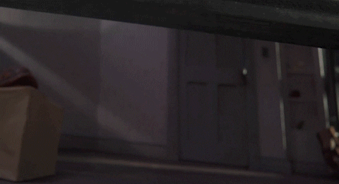 Coraline Peeking Under Bed GIF