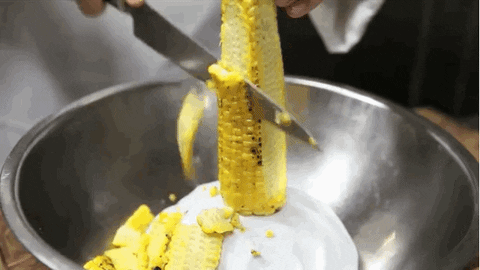Slicing Corn In Stainless Steel Bowl GIF
