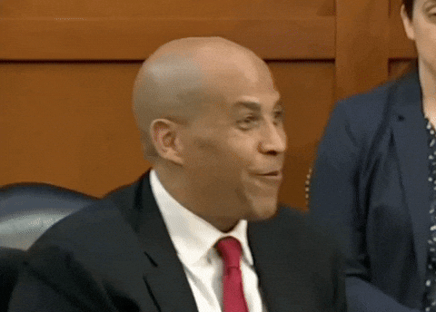 Cory Booker Watch Me Shoulder Brush GIF