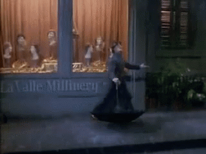 Cosmo Brown Singing In The Rain GIF