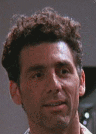 Cosmo Kramer Nodding Agree While Smiling GIF
