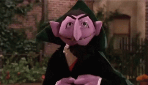 Count Von Count Holding Ice Cream Cone And Cape GIF
