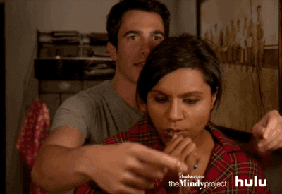 Couple Aiding On Necklace Mindy Project GIF