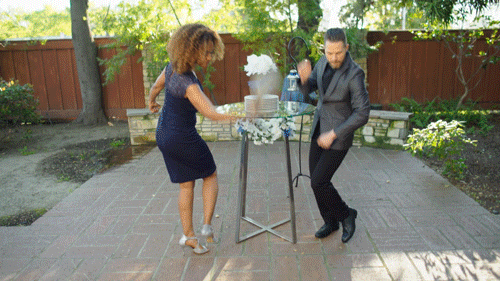 Couple Celebrating Breaking Dish Mazel Tov GIF
