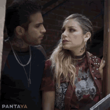 Couple Doing Beso Looking Around GIF
