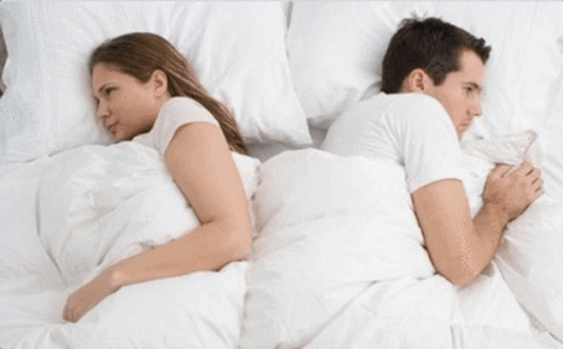 Couple Having Relationship Problem In Bed GIF