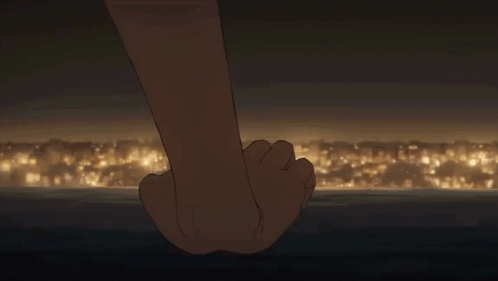 Couple Holding Hands Gazing in Dark Room