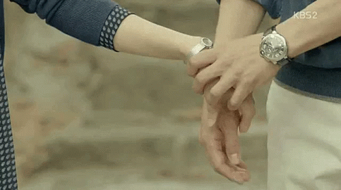Couple Holding Hands Woman Wearing Watch