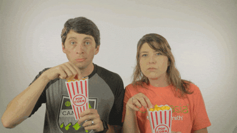 Couple Intrigued With The Topic GIF