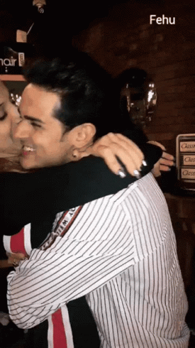 Couple Kiss On Cheek Boomerang GIF