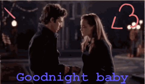 Couple Kissing Goodnight Baby