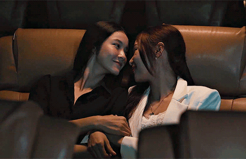 Couple Kissing on a Couch