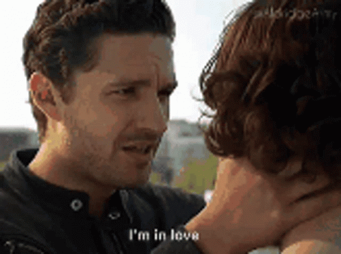 Couple Looking, Man Saying I'm in Love