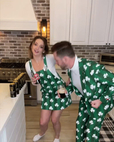 Couple Matching Attire Dancing GIF