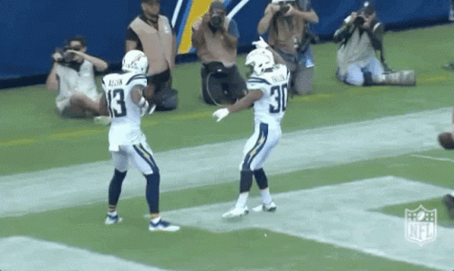 Couple Of Football Players On Field GIF