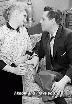 Couple On Couch Saying I Know And I Love You GIF