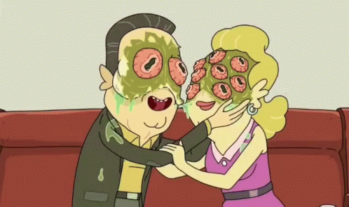 Couple on Couch Woman with Mask