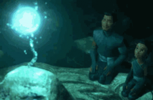 Couple Sitting in Cave Watching Light from Ground