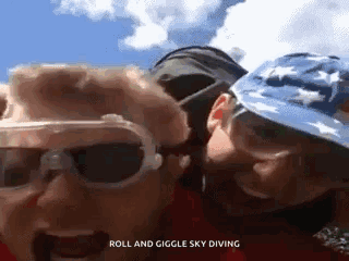 Couple Standing Roll and Giggle Sky Diving