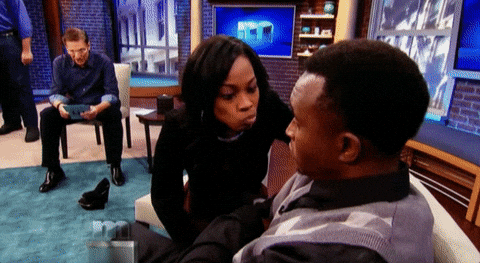 Couple Stare Down Maury Povich Show GIF
