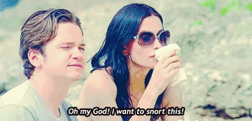 Courteney Cox Snorting Pumpkin Spice Latte GIF