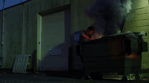 Covering Dumpster Fire GIF