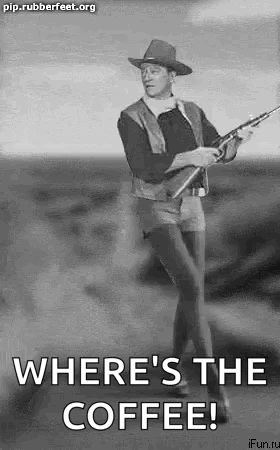 Cowboy Hat Man Holding Gun Black and White