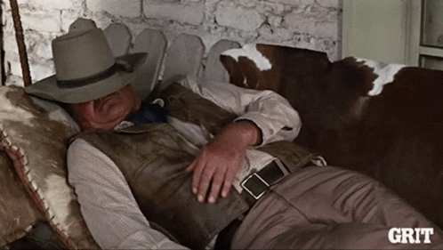 Cowboy Hat Man Holding Gun in Forest Movieclips.com