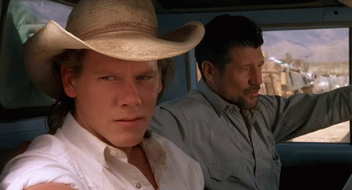 Cowboy Hat Man Next To Man In Car GIF