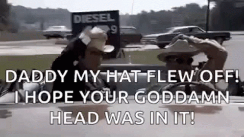 Cowboy Hats Sitting in Car Talking