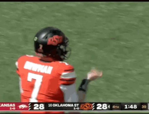 Cowboy in Orange Hat and Orange Pants