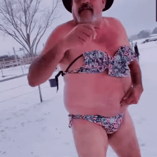 Cowboy Wearing Bikini Dancing On Snow Day GIF