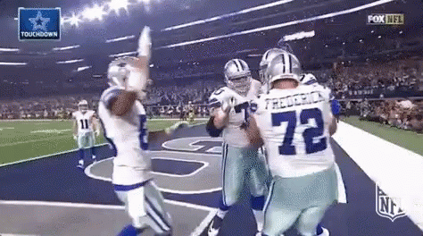 Cowboys Players Celebrating on Field
