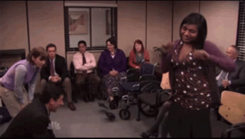 Kelly Kapoor Dancing While Co Worker Giving Cpr GIF