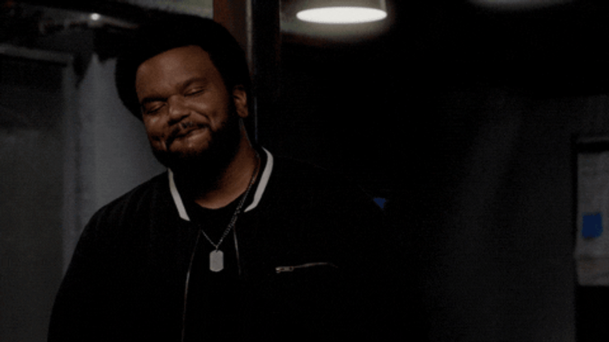 Craig Robinson Trying Not To Laugh GIF