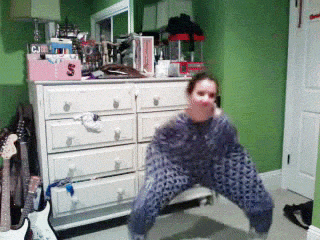 Crazy Dancing Woman Wearing Pajama Until Her Shoulders GIF