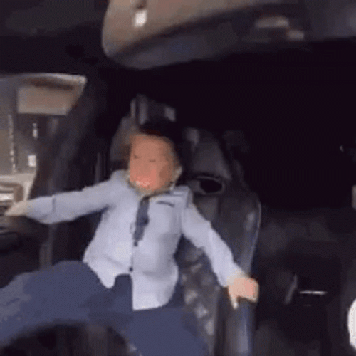 Crazy Driving Kid Holding On GIF