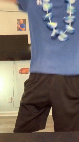 Irritated Man With Hawaiian Necklace Throwing Credit Card GIF