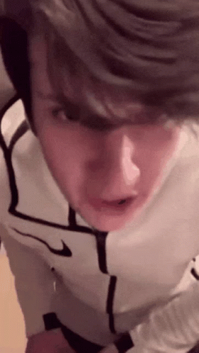 Irritated Guy Handing Out Credit Card GIF