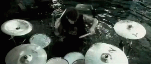 Creed Band Drummer Playing Drums In Water GIF