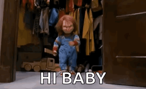 Creepy Doll Standing in Closet Saying Hi Baby