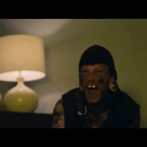 Creepy Guy Chuckling GIF