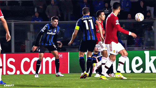 Cristiano Ronaldo Scoring A Goal Wearing Red And White Jersey GIF