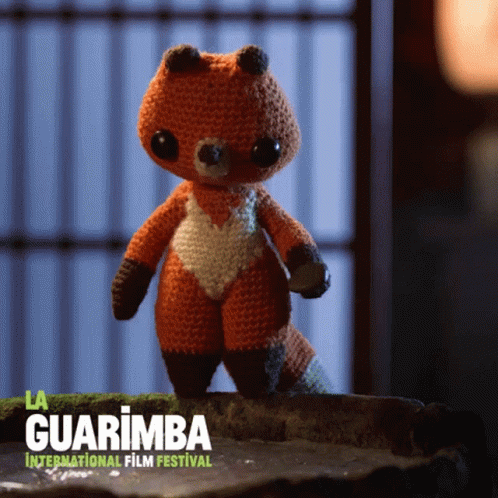Crocheted Fox Standing on Rock