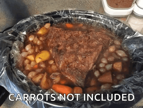 Crock Pot Filled With Carrots and Potatoes