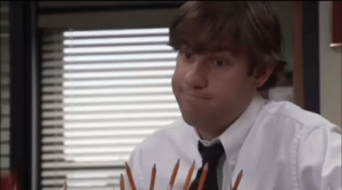 Cross Fingers Forced Smile GIF