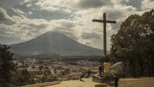 Cross With Mountain Surrounded by Trees